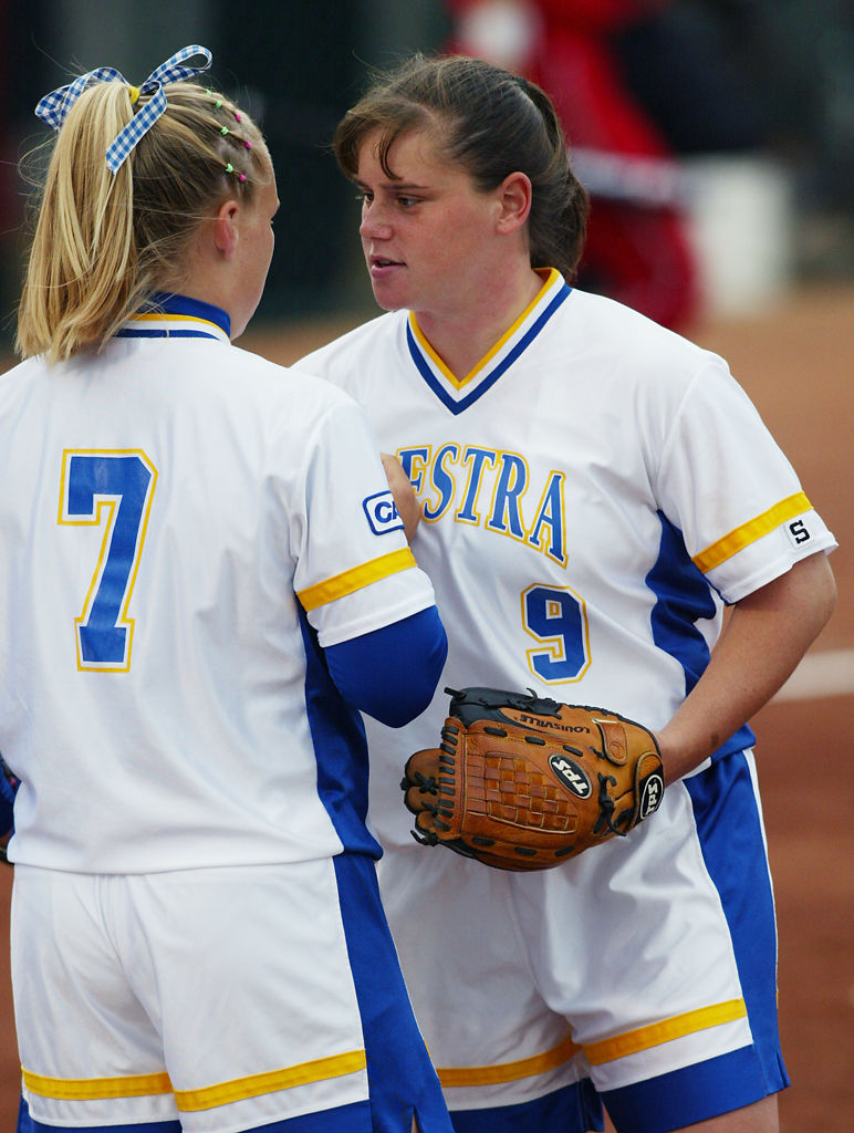 Adrienne Clark, left, relieves Hofstra starting pitcher Sara DeAngelis